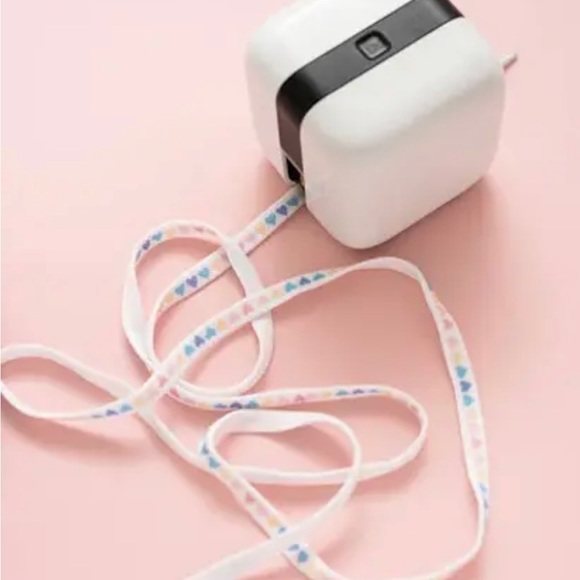 Mini printer. 
Glide, print, and make DIY designs with this handheld PrintMaker. - Picture 8 of 13